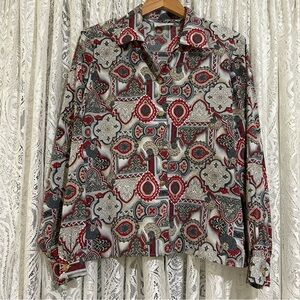 Vintage long sleeved button up blouse. Select by Elite.